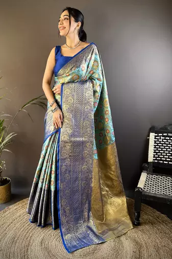 sky blue silk blend saree with unstitched blouse piece.