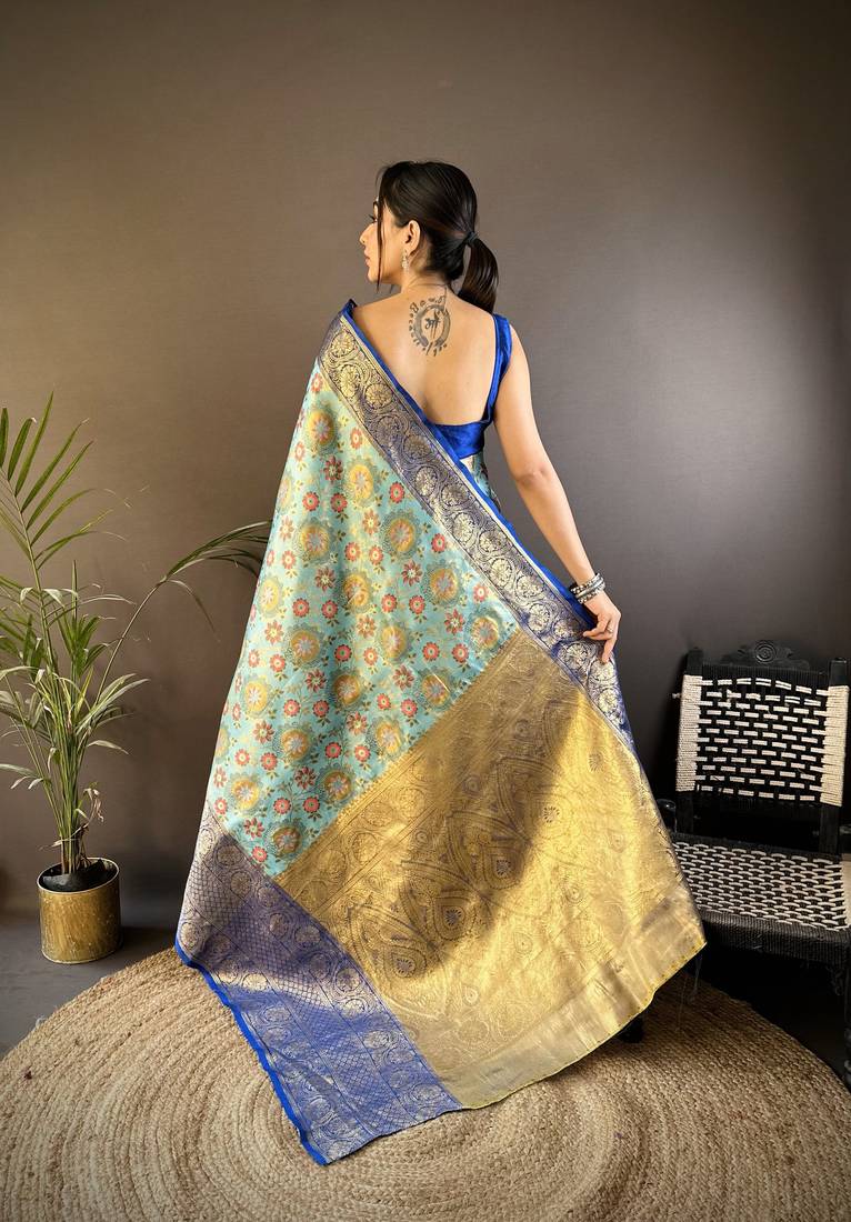 sky blue silk blend saree with unstitched blouse piece.