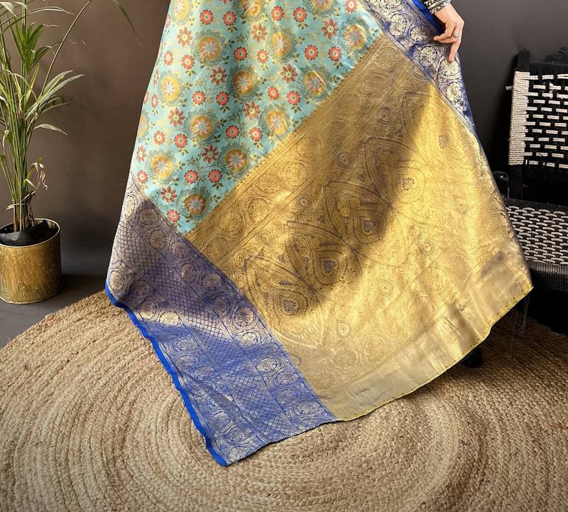 sky blue silk blend saree with unstitched blouse piece.