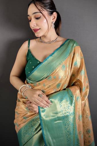 beige kanjeevaram silk blend zari woven saree with unstitched blouse piece.