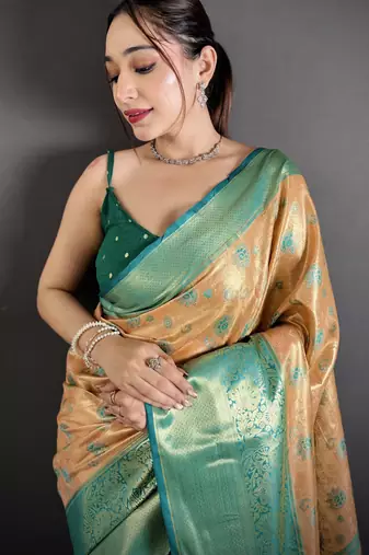 beige kanjeevaram silk blend zari woven saree with unstitched blouse piece.