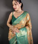 beige kanjeevaram silk blend zari woven saree with unstitched blouse piece.