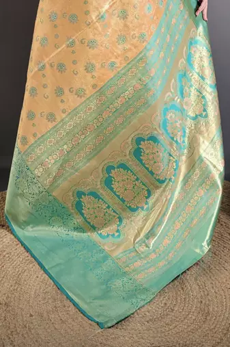 beige kanjeevaram silk blend zari woven saree with unstitched blouse piece.