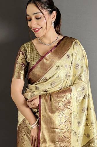 cream kanjeevaram silk blend zari woven saree with unstitched blouse piece.