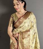 cream kanjeevaram silk blend zari woven saree with unstitched blouse piece.