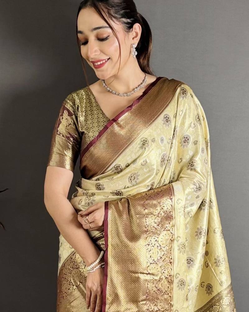 cream kanjeevaram silk blend zari woven saree with unstitched blouse piece.