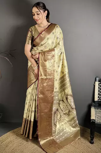 cream kanjeevaram silk blend zari woven saree with unstitched blouse piece.