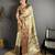 cream kanjeevaram silk blend zari woven saree with unstitched blouse piece.