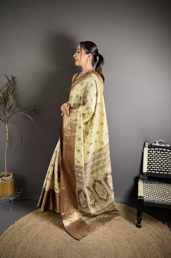 cream kanjeevaram silk blend zari woven saree with unstitched blouse piece.