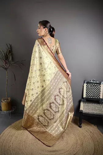 cream kanjeevaram silk blend zari woven saree with unstitched blouse piece.