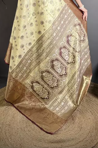 cream kanjeevaram silk blend zari woven saree with unstitched blouse piece.
