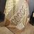 cream kanjeevaram silk blend zari woven saree with unstitched blouse piece.