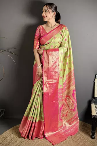 green kanjeevaram silk blend zari woven saree with unstitched blouse piece.