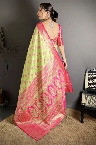 green kanjeevaram silk blend zari woven saree with unstitched blouse piece.