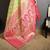 green kanjeevaram silk blend zari woven saree with unstitched blouse piece.