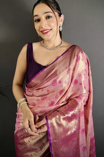 pink kanjeevaram silk blend zari woven saree with unstitched blouse piece.