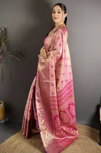 pink kanjeevaram silk blend zari woven saree with unstitched blouse piece.