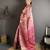 pink kanjeevaram silk blend zari woven saree with unstitched blouse piece.