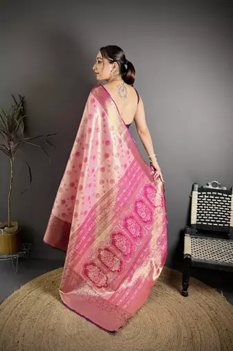 pink kanjeevaram silk blend zari woven saree with unstitched blouse piece.