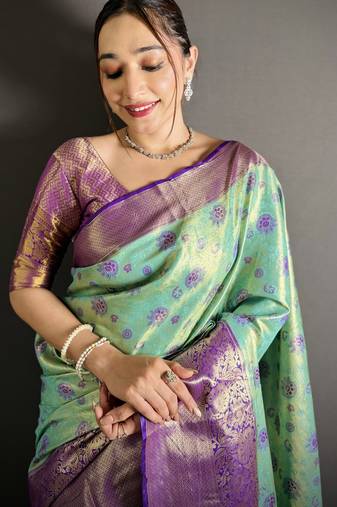 rama kanjeevaram silk blend zari woven saree with unstitched blouse piece.