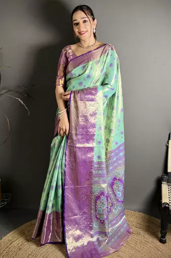rama kanjeevaram silk blend zari woven saree with unstitched blouse piece.