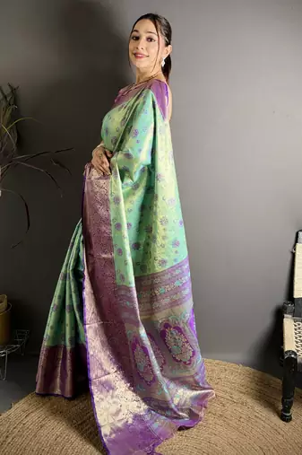 rama kanjeevaram silk blend zari woven saree with unstitched blouse piece.