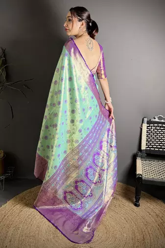rama kanjeevaram silk blend zari woven saree with unstitched blouse piece.