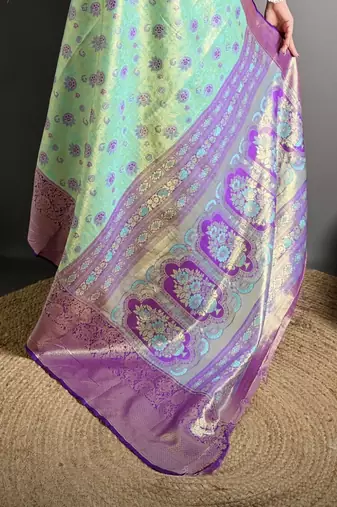 rama kanjeevaram silk blend zari woven saree with unstitched blouse piece.
