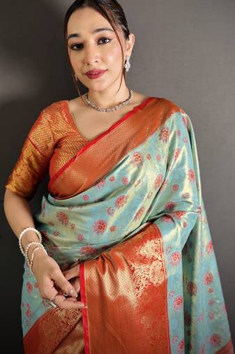 sky blue kanjeevaram silk blend zari woven saree with unstitched blouse piece.