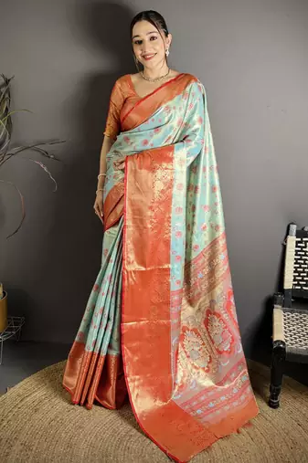 sky blue kanjeevaram silk blend zari woven saree with unstitched blouse piece.