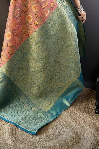 pink silk blend saree with unstitched blouse piece.