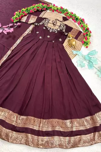wine color elegant floral embroidery with rich zari weaving border silk blend anarkali gown set