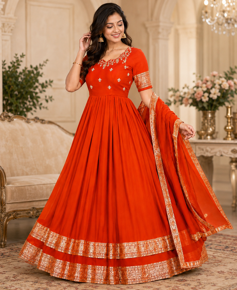 orange color elegant floral embroidery with rich zari weaving border silk blend anarkali gown set