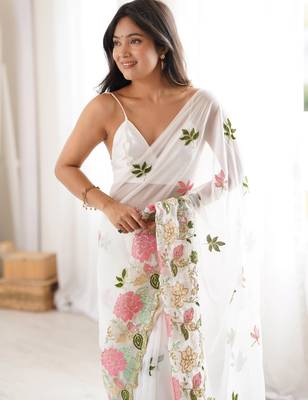 White georgette sequins saree with unstitched blouse piece. 1