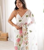 White georgette sequins saree with unstitched blouse piece.