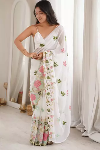 White georgette sequins saree with unstitched blouse piece.