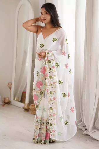 White georgette sequins saree with unstitched blouse piece.