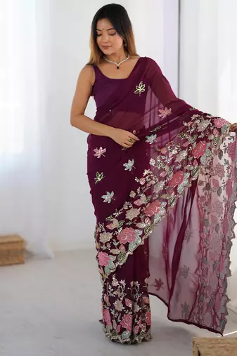 Wine georgette sequins saree with unstitched blouse piece.