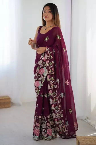 Wine georgette sequins saree with unstitched blouse piece.