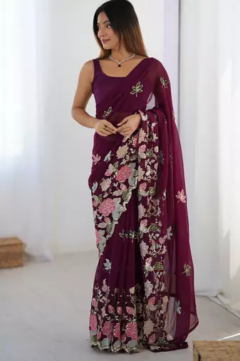 Wine georgette sequins saree with unstitched blouse piece.
