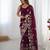 Wine georgette sequins saree with unstitched blouse piece.