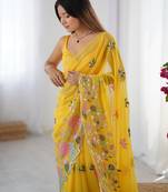 Yellow georgette sequins saree with unstitched blouse piece.