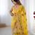 Yellow georgette sequins saree with unstitched blouse piece.