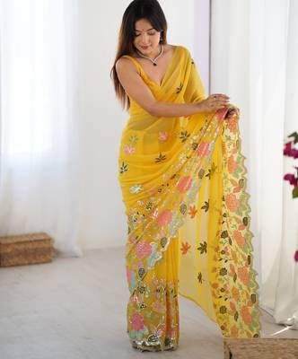 Yellow georgette sequins saree with unstitched blouse piece. 2