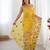 Yellow georgette sequins saree with unstitched blouse piece.