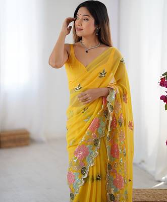 Yellow georgette sequins saree with unstitched blouse piece. 4
