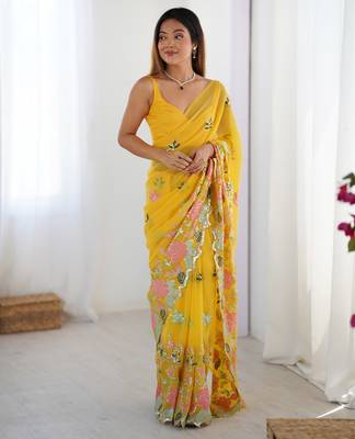 Yellow georgette sequins saree with unstitched blouse piece. 5