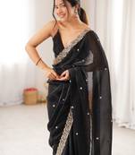 Black tissue satin embroidered saree with unstitched blouse piece.