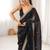 Black tissue satin embroidered saree with unstitched blouse piece.