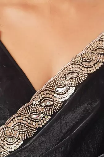 Black tissue satin embroidered saree with unstitched blouse piece.